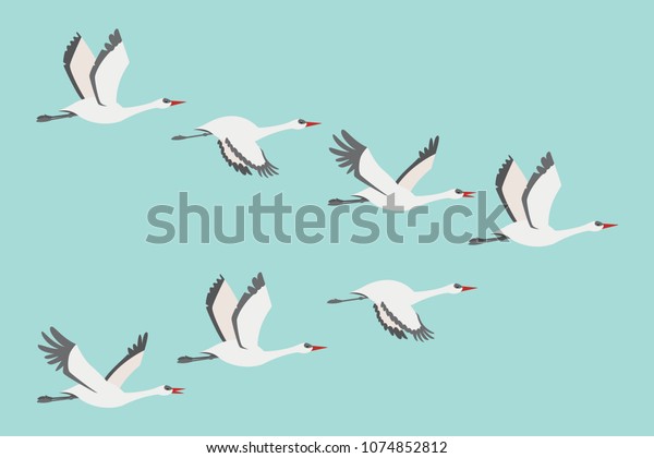 飛ぶ鶴の群れ 青の背景に鳥の移動のベクター画像フラットイラスト のベクター画像素材 ロイヤリティフリー 1074852812