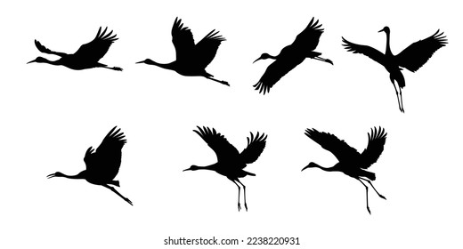 Flock of cranes or storks black silhouette in flight vector flat illustration on white background.