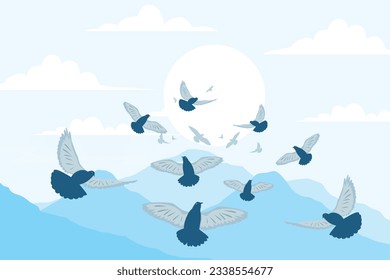 A flock of doves flies against a backdrop of mountains and blue clouds