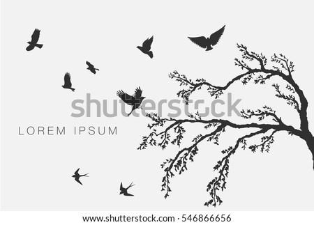 flock of flying birds on tree branch