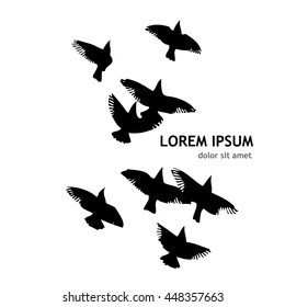 A flock of flying birds. Vector