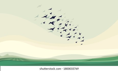 Flock of flying birds. Wildlife scenery.