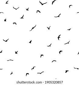 A flock of flying silhouette birds. Bird seamless pattern. Black on white background. Vector illustration