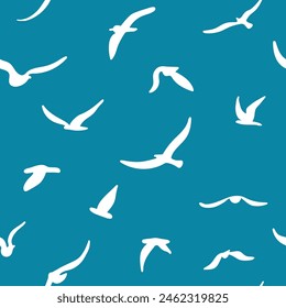 Flock of flying silhouette birds. Birds seamless pattern. White seagulls on a blue background. Vector illustration. 