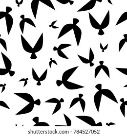 Flock Pattern. Seamless Pattern of Birds in Ethnic Style. Flocked Wallpaper. Flock Pattern for Textiles, Banner, Pouring, Surface Textures, Wrapping Paper, Tile. Vector Abstract Seamless Pattern.