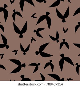 Flock Pattern. Seamless Pattern of Birds in Ethnic Style. Flocked Wallpaper. Flock Pattern for Textiles, Banner, Pouring, Surface Textures, Wrapping Paper, Tile. Vector Abstract Seamless Pattern.