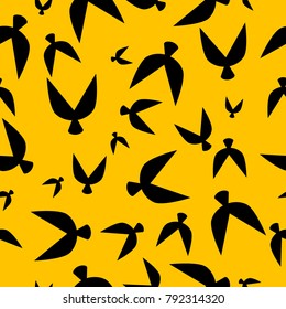 Flock Pattern. Seamless Pattern of Birds in Ethnic Style. Flocked Wallpaper. Flock Pattern for Textiles, Banner, Pouring, Surface Textures, Wrapping Paper, Tile. Vector Abstract Seamless Pattern.
