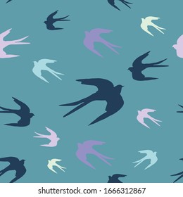 flock of swallow birds in flight