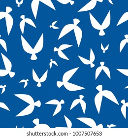 Flocked Wallpaper. Seamless Pattern of Birds in Ethnic Style. Flock Pattern. Birds Pattern for Textiles, Banner, Pouring, Surface Textures, Wrapping Paper, Tile. Vector Ornamental Background. 