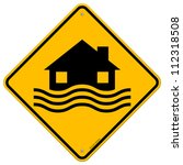 Flood Disaster Yellow Sign - House and waves on yellow sign isolated on white background