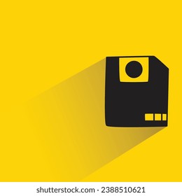 floppy disk with shadow on yellow background