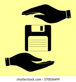 Floppy disk sign. Save or protect symbol by hands.