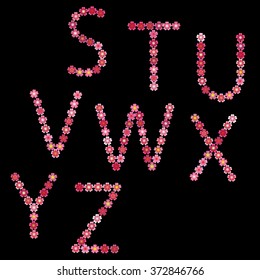 Floral alphabet isolated on black background. Vector