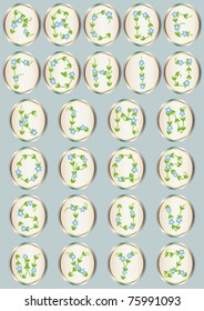 Floral alphabet set with  leaves and blue flowers