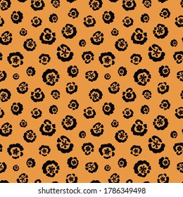 floral animal print (jaguar) seamless repeat pattern in next-level black and iced mango
