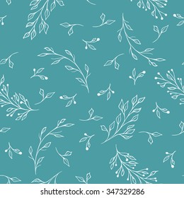  Floral background with hand drawn leaves and branches. Seamless floral pattern that could be used for wallpaper, fabric, wrapping paper. Pattern uses blue and white colors.
