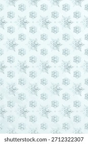 A floral background with a light blue background featuring delicate blue floral patterns, creating a soft, elegant texture. Winter background with copy space vector.