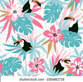 Floral background with tropical flowers, leaves and toucans. Vector seamless pattern for stylish fabric design.
