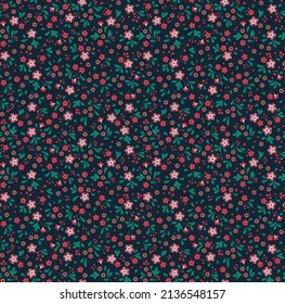 Floral background in vintage style. Decorative embroidery flowers. Vector seamless pattern. Ornament for textiles on dark blue background. Small pink flowers. The elegant template.
