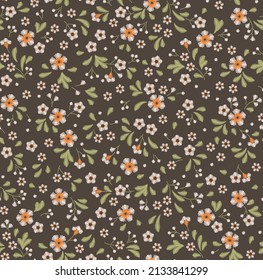 Floral background in vintage style. Vector seamless pattern. Decorative embroidery flowers. Ornament for textiles on brown background. Small white flowers. The elegant the template for fashion prints.