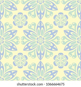 Floral beige seamless pattern. Beige background with light blue and green flower designs for wallpapers, textile and fabrics