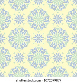Floral beige seamless pattern. Beige background with light blue and green flower designs for wallpapers, textile and fabrics