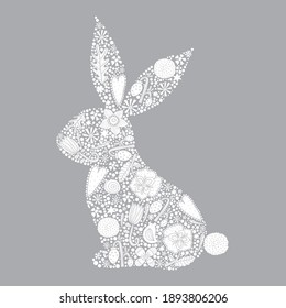 Floral black silhouette of an Easter Bunny. Cute vector illustration.
