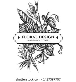 Floral bouquet design with black and white gloriosa, anthurium, strelitzia