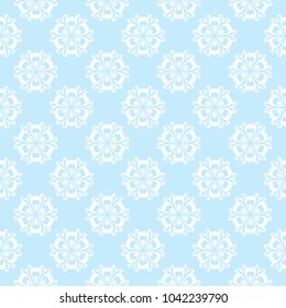 Floral colored seamless pattern. Blue and white background with fower elements for wallpapers.