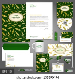 Floral corporate identity template with golden leaves. Vector company style for brandbook and guideline. EPS 10
