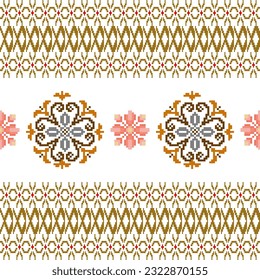 Floral Cross Stitch Embroidery on white background.geometric ethnic oriental seamless pattern traditional.Aztec style abstract vector illustration.design for texture,fabric,clothing,wrapping,sarong.