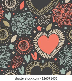 Floral cute seamless pattern on the dark background. Scribble backdrop with hearts and flowers. Fabric decorative doodle texture