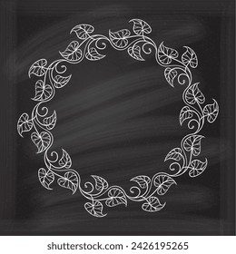 Floral decoratare frame on a chalkboard background. Monogram, wedding invitation or greeting card template. 