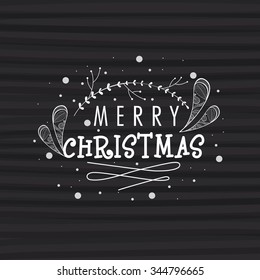 Floral decorated greeting card for Merry Christmas celebration.