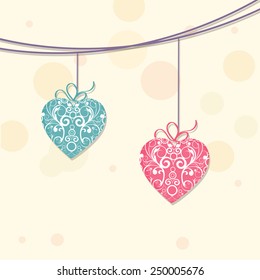Floral decorated hanging heart for Happy Valentine's Day and other occasion celebration.