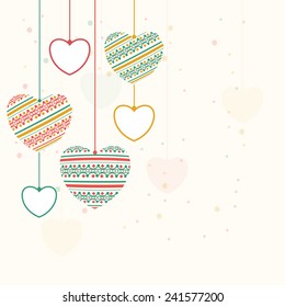 Floral decorated hanging hearts with space for your wishes for Happy Valentine's Day celebration.