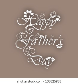 Floral decorated text Happy Fathers Day on brown background.