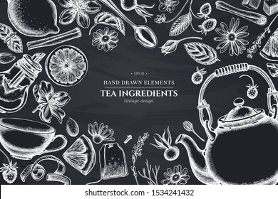 Floral design with chalk cinnamon, lemons, oranges, tea bag, sugar cubes, heather, chamomile, dog rose, peppermint, almond, strawberry, teaspoon, teapots, cups, sugar bowl