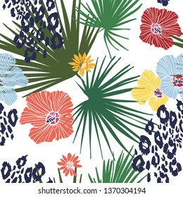 Floral design seamless background pattern . Palm leaves, hibiscus flowers. Vector illustration hand drawn.