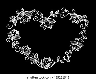Floral doodle frame in the shape of heart. 