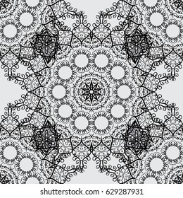 Floral doodle. Gray background. Zentangle style. Seamless pattern for adult coloring book. Ethnic, floral, retro, doodle, vector, tribal design element.