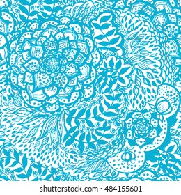 Floral doodle seamless wallpaper pattern. Illustration with paisley ornaments. Textile with hand-drawn flowers.