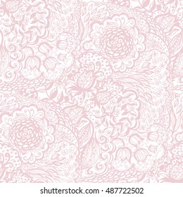 Floral doodle seamless wallpaper pattern. Illustration with paisley ornaments. Textile with hand-drawn flowers.