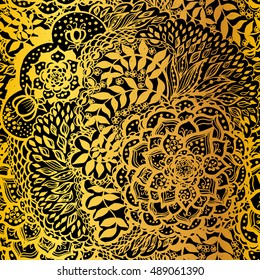 Floral doodle seamless wallpaper pattern. Illustration with paisley ornaments. Textile with hand-drawn flowers. Gold color.