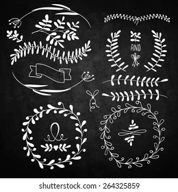 Floral doodle set decorations. Elements are arranged on a black background with imitation of texture chalkboards.