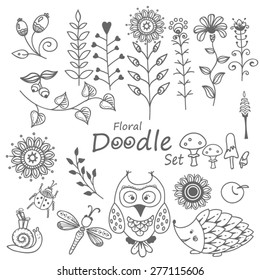 Floral doodle set. Snail, owl, dragonfly and hedgehog.