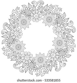 Floral doodles wreath in zentangle ornamental style. Vector circle frame made of flowers. Patterned background for adult coloring page, aret therapy. Spring and summer collection. Invitation template.