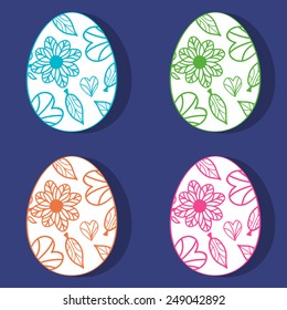 Floral Easter eggs, on the blue background