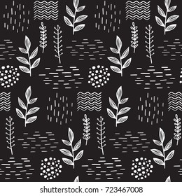 Floral elegant seamless hand-drawn pattern with white plants on black background. Scandinavian design style. Vector illustration