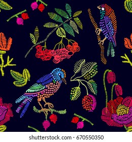 Floral embroidery with rowan. Seamless vector pattern with birds, berries and flowers. Vintage motifs. Retro textile design collection. Colorful on dark.